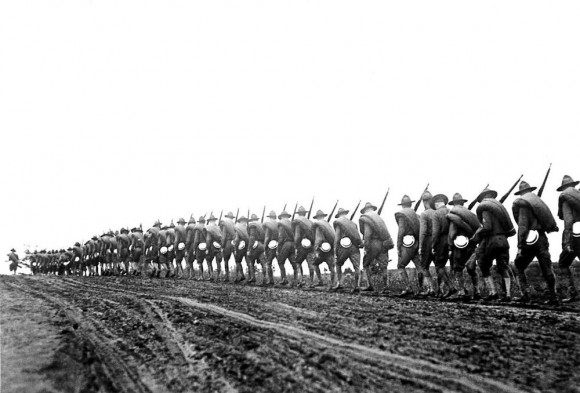 American troops march in line to the front in 1918. Photo published by Editions de la Martiniere, Paris, France. 