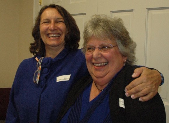 Democrats Lauren Gister (left) and Charlene Janecek celebrate their respective elections.